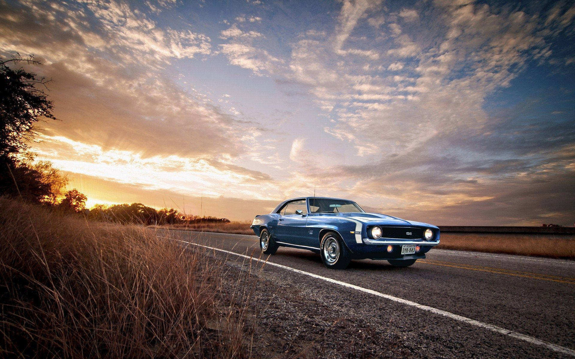 Blue Striped Chevrolet Camaro Muscle Car Background