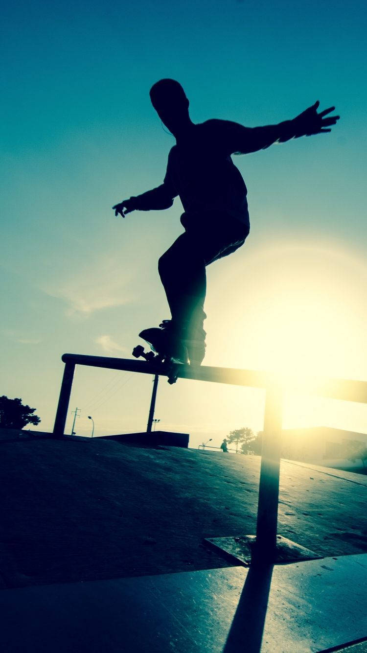 Blue-toned Silhouette Skateboard Iphone Background