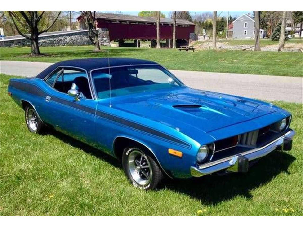 Blue Vintage Plymouth Barracuda On Grass