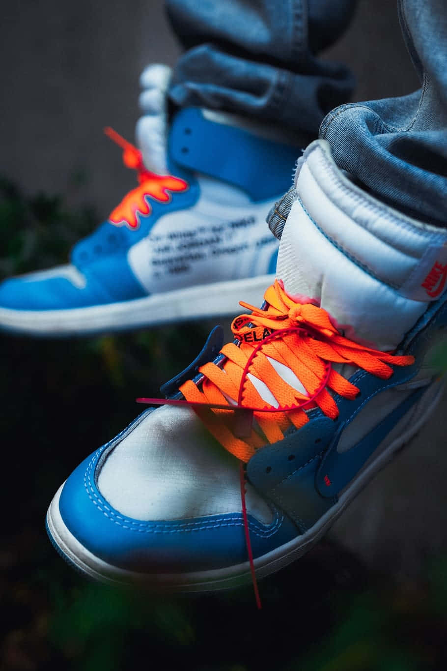 Blueand Orange Sneakers Closeup Background