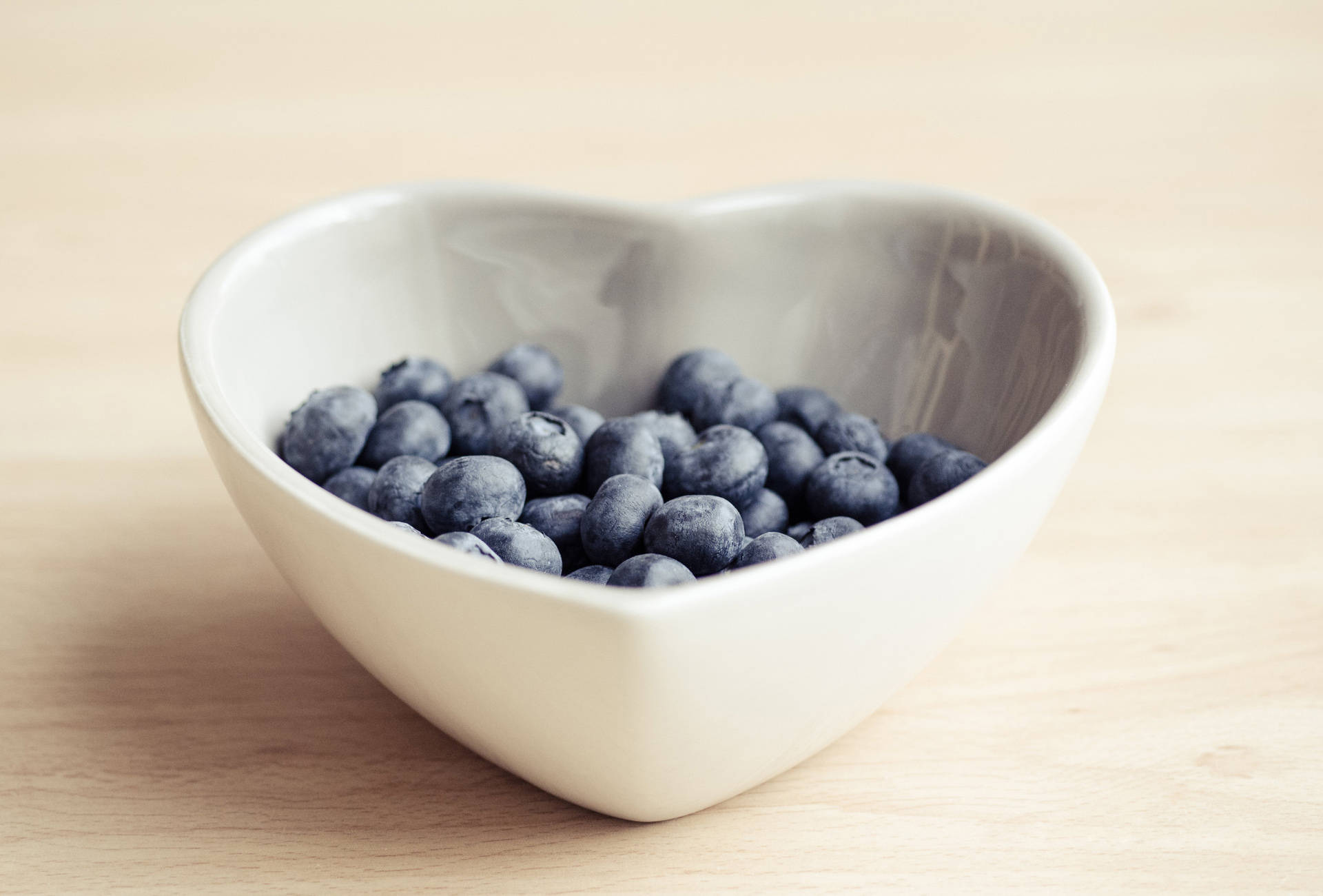 Blueberries In Heart Bowl
