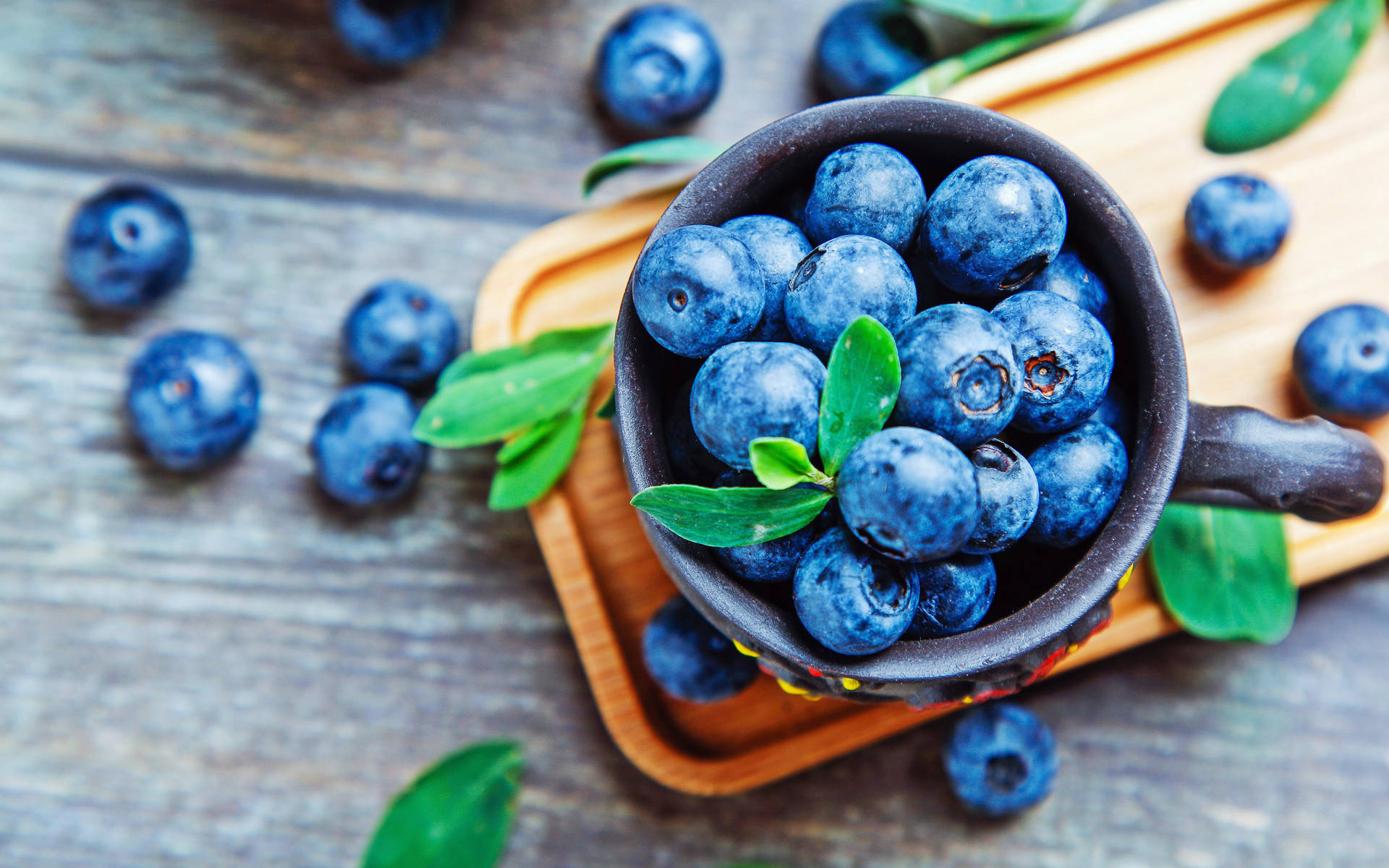 Blueberries Mug On A Table Background