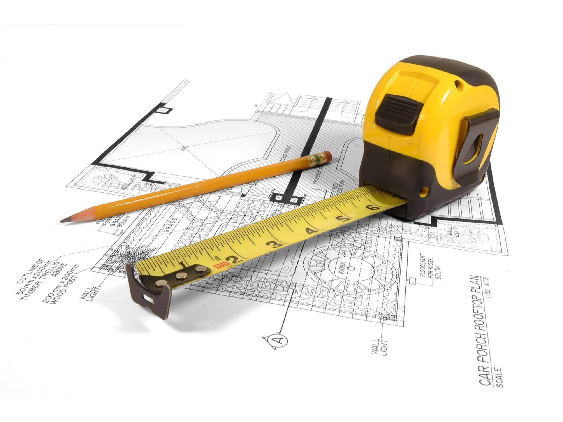 Blueprints With Measuring Tape And Pencil Background