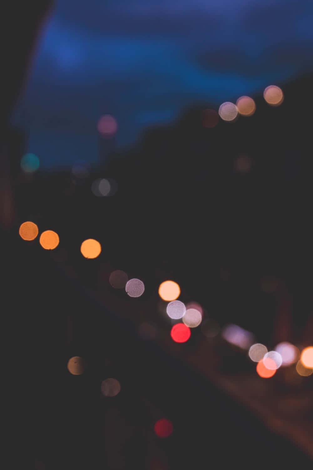 Blurred Lights In The City At Night Background