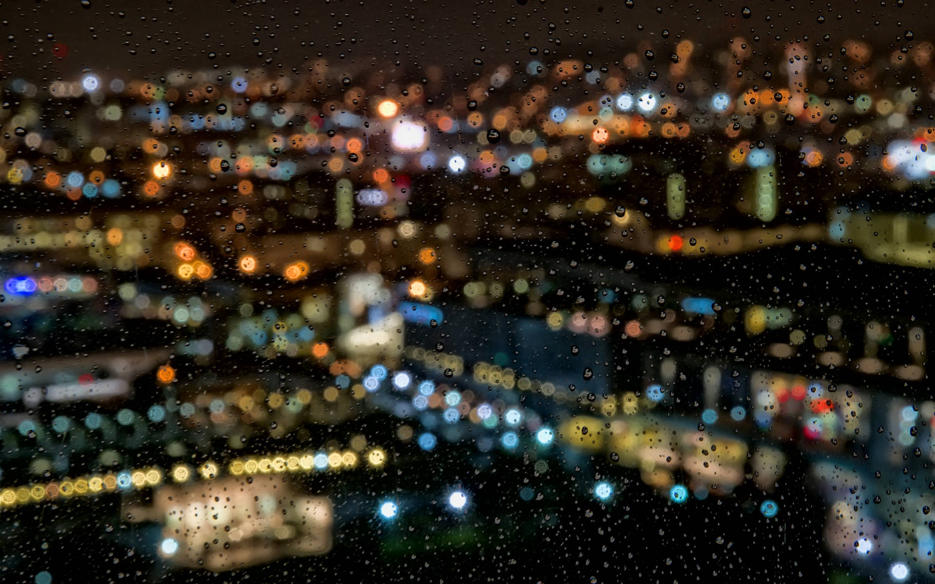 Blurry City View After The Rain Background