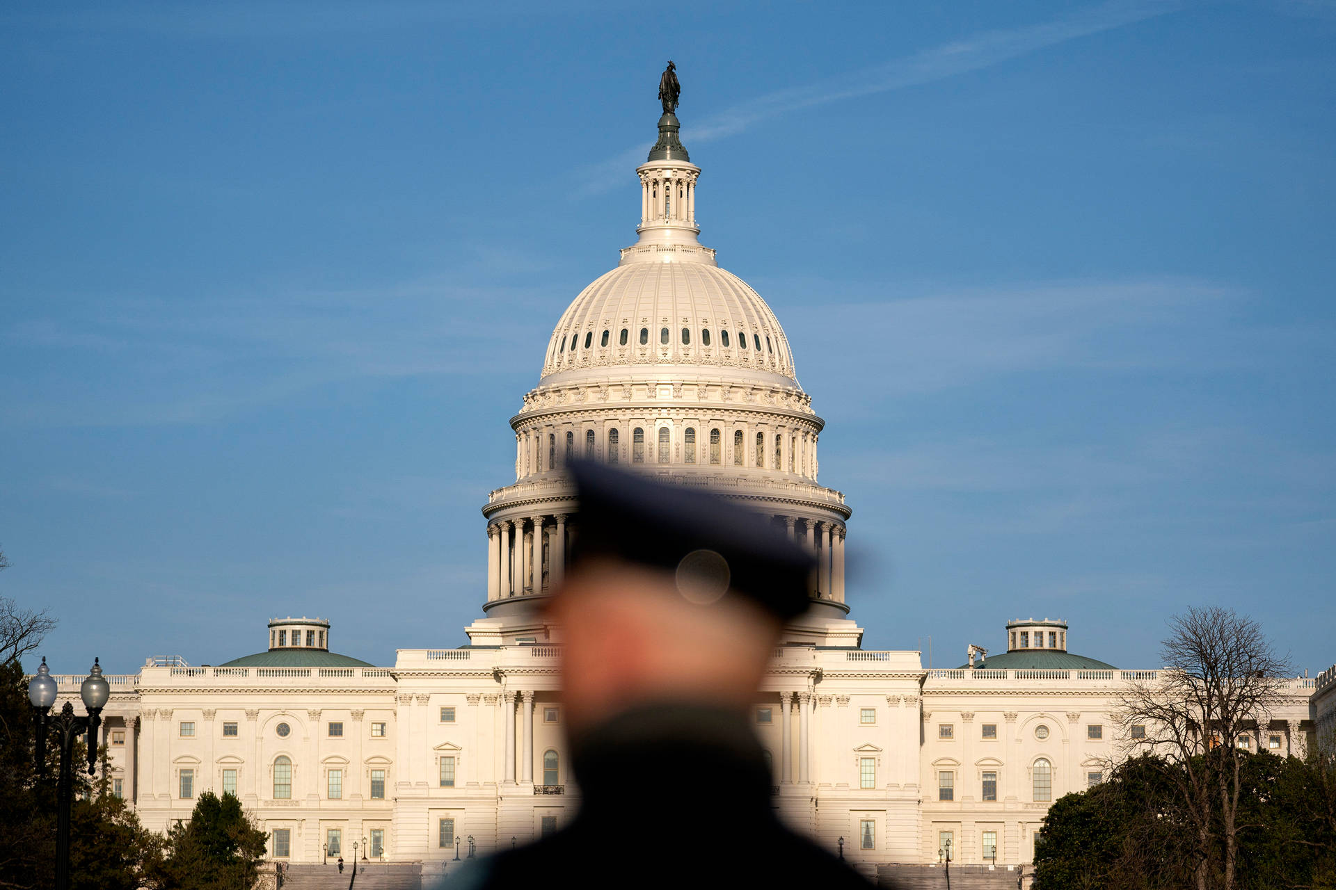 Blurry Police And Capitol Hill Background