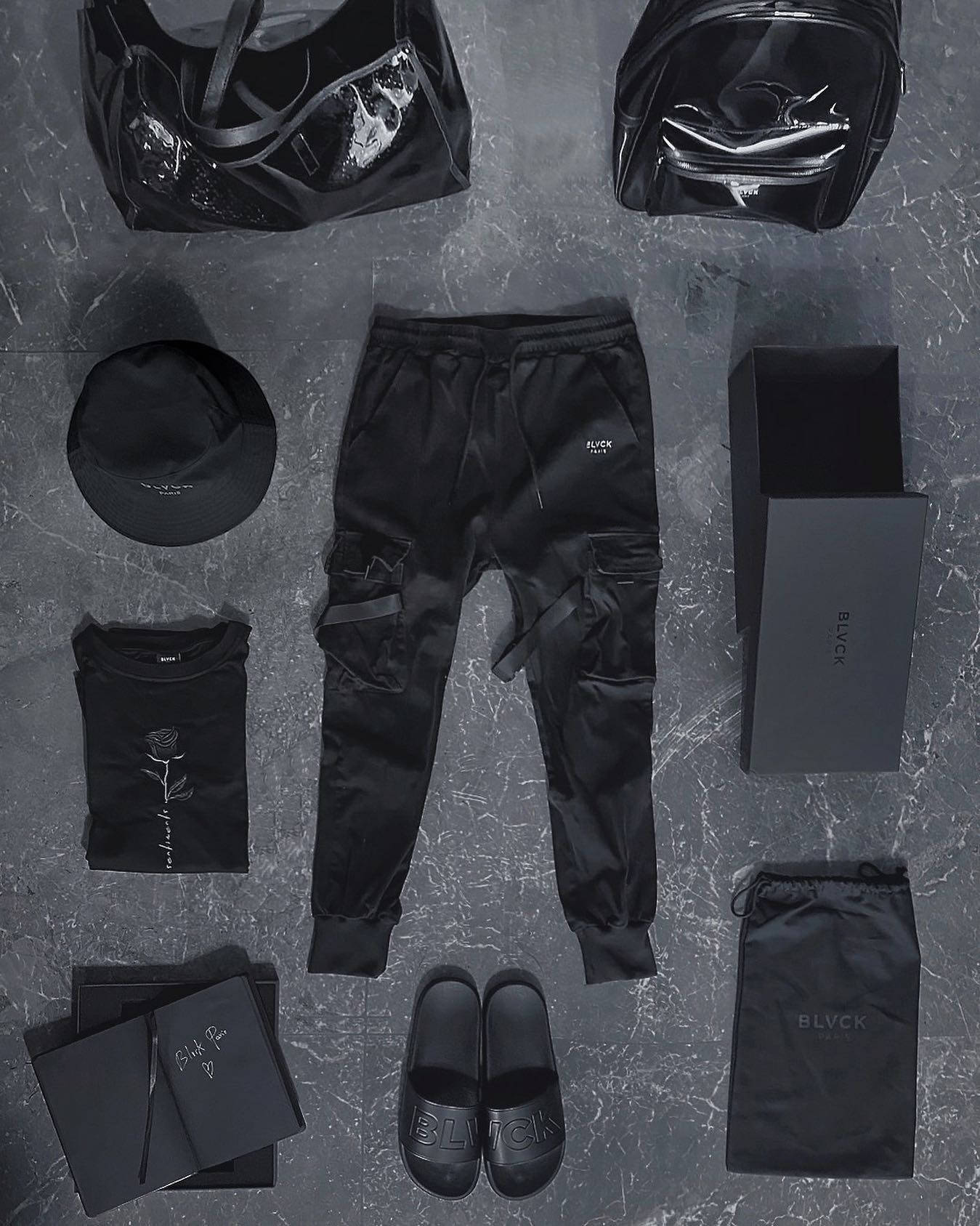 Blvck Paris Outfit Flatlay Background