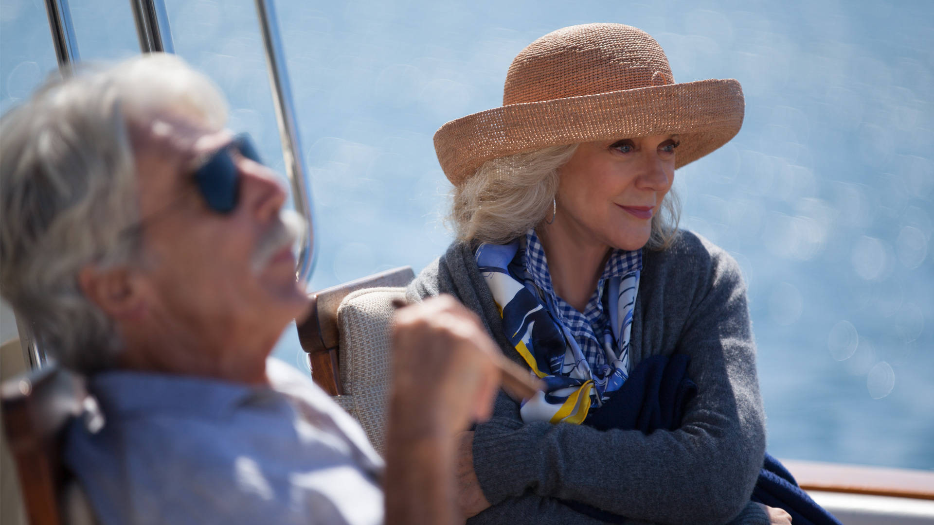 Blythe Danner Wearing Straw Bowler Background