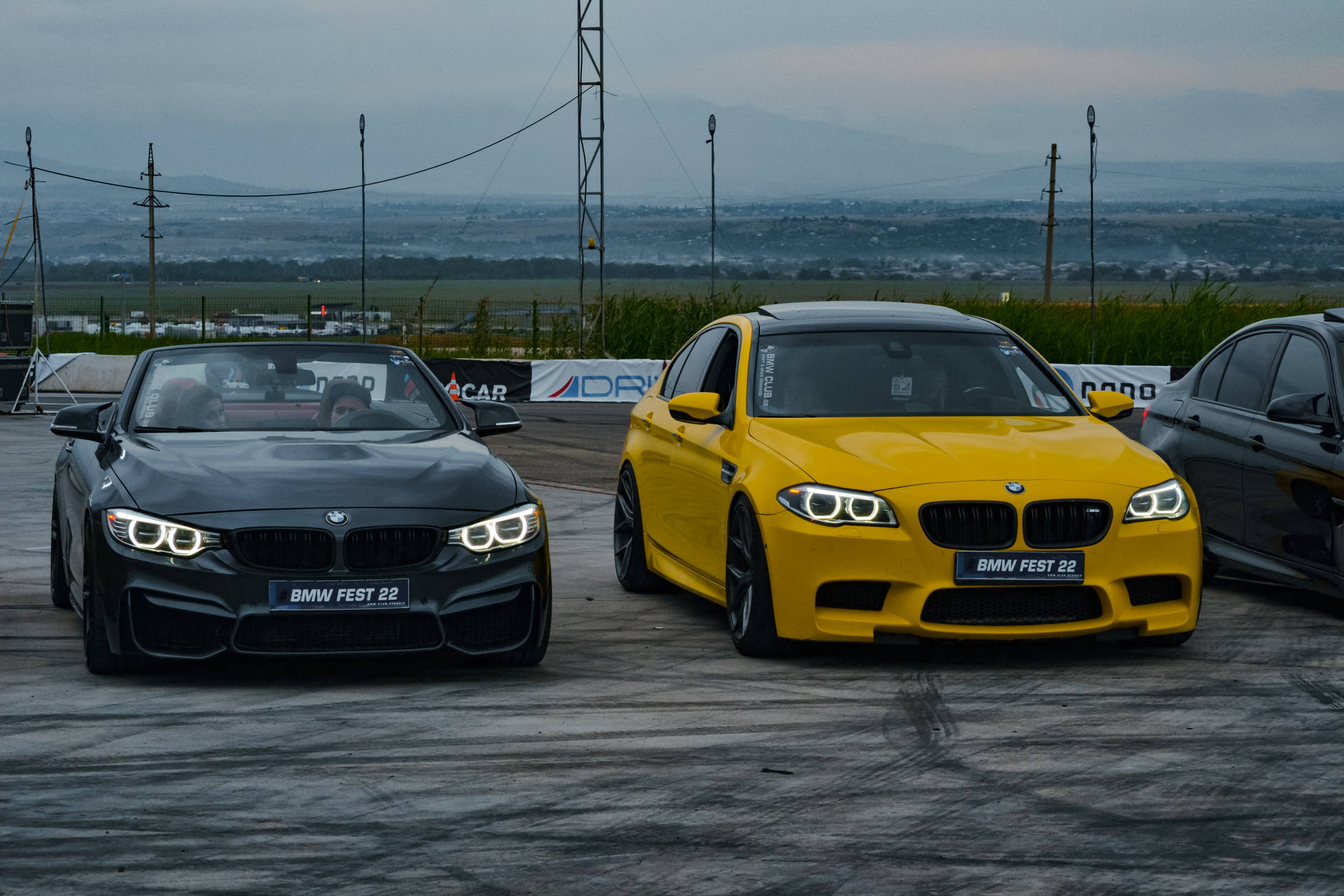 Bmw Cars At Racing Track Background