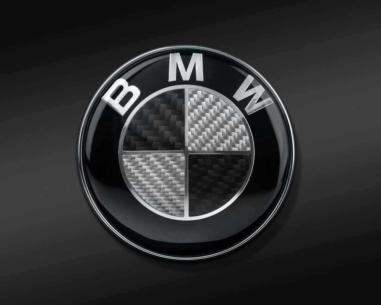 Bmw Logo On A Charcoal Grey Background Background