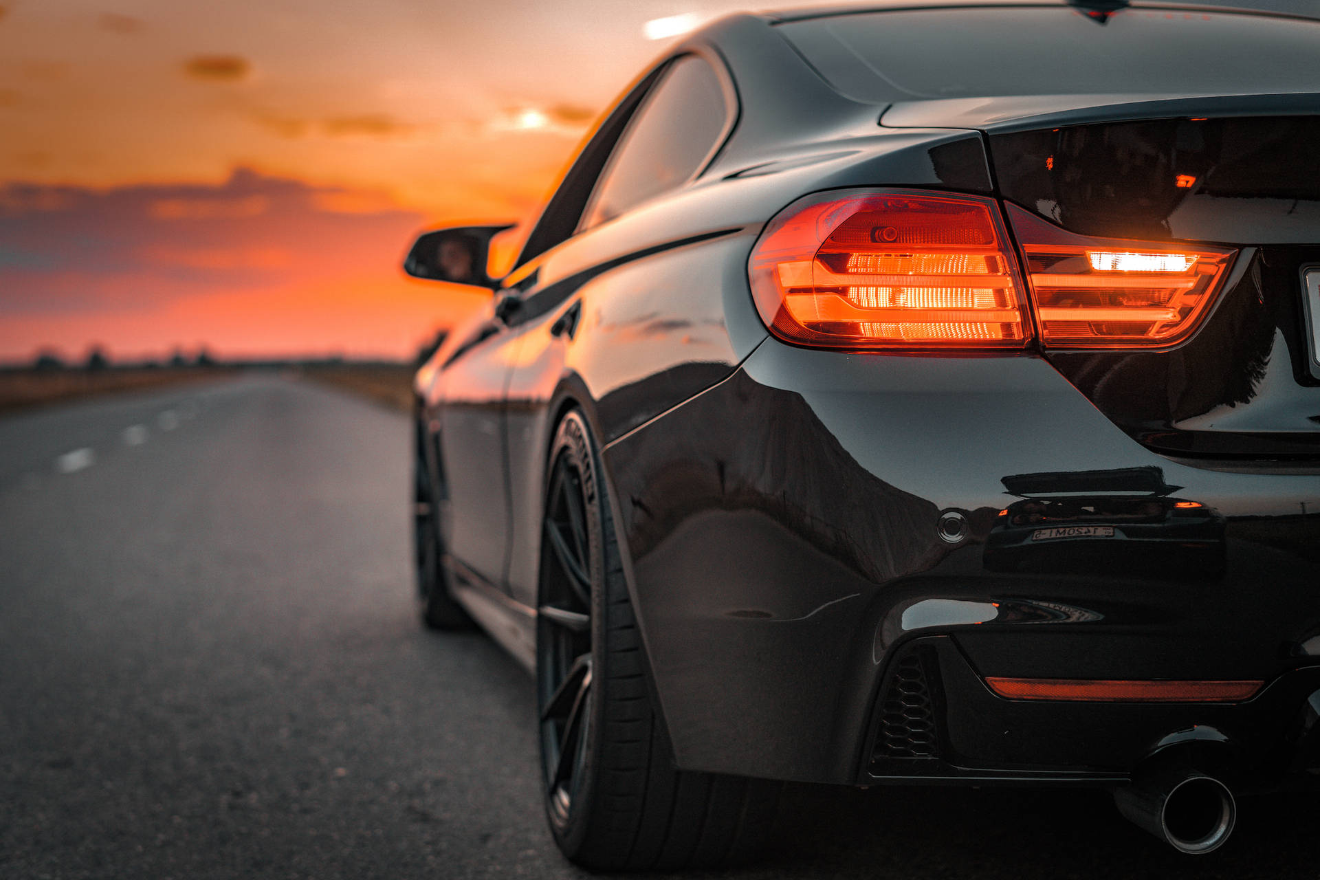Bmw M In A Road At Sunset Background