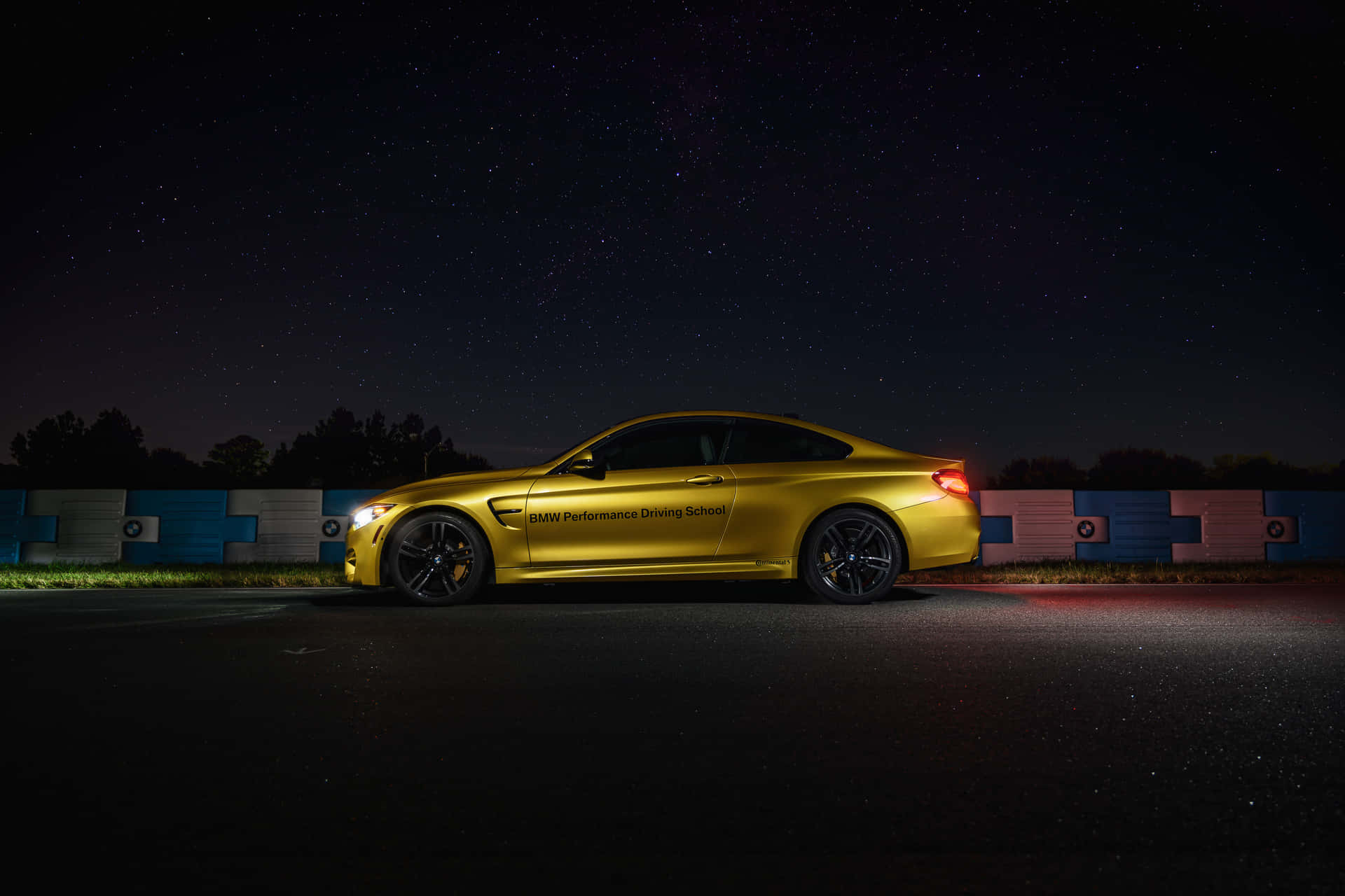 Bmw M4 Coupe At Night With Stars In The Sky Background