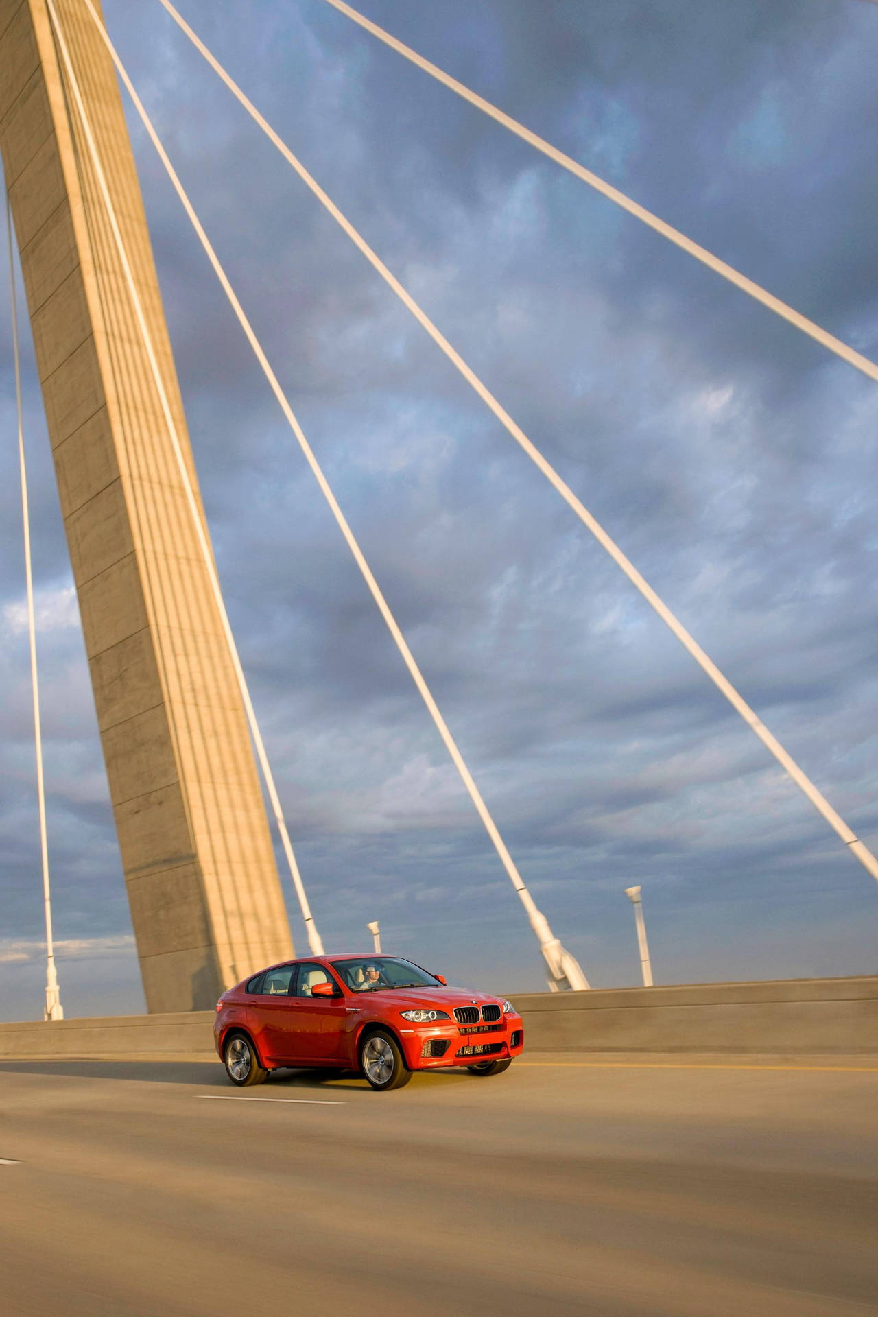 Bmw X6 M On A Road Bridge Background