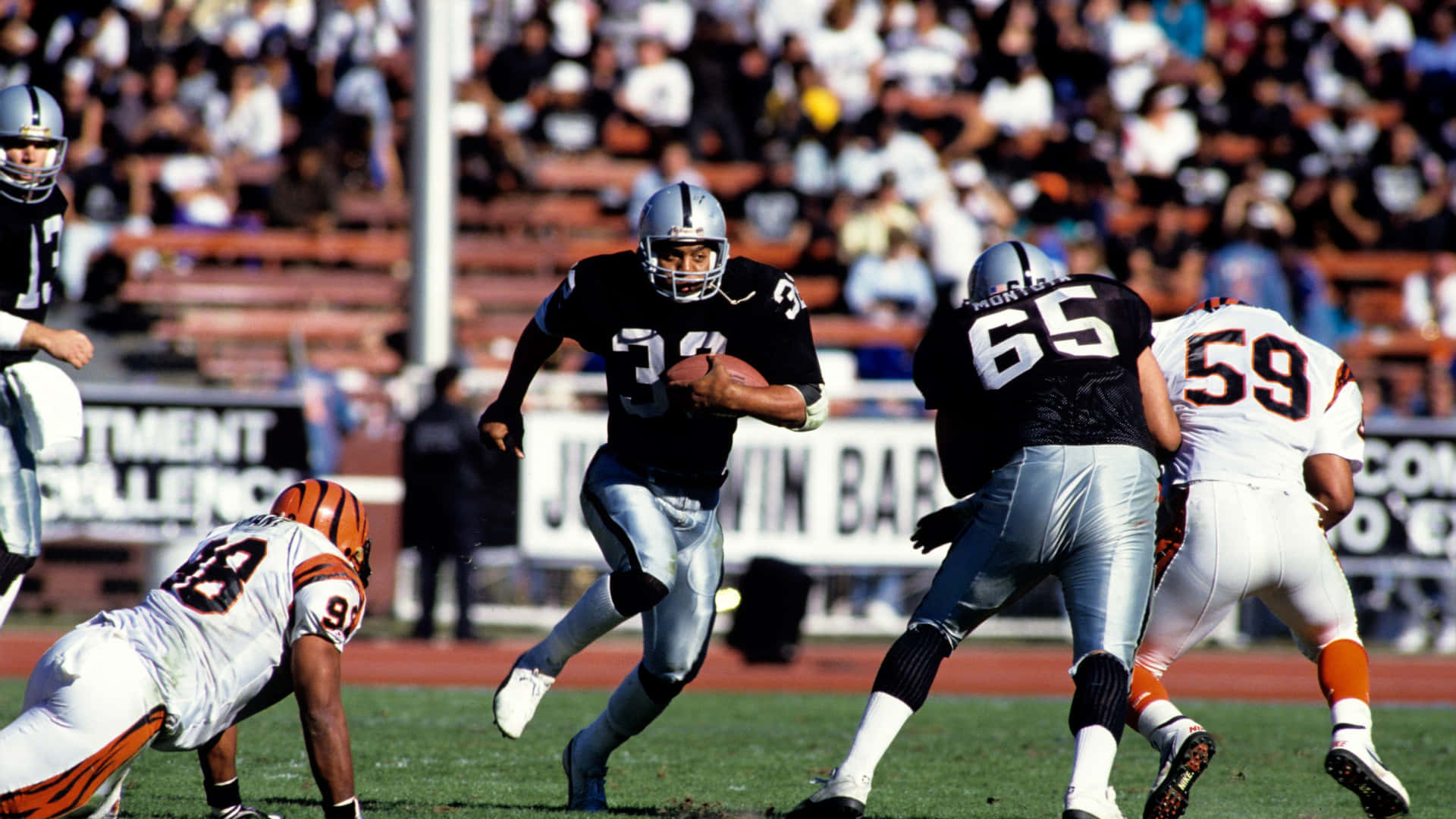 Bo Jackson With An Opponent Tripping Background