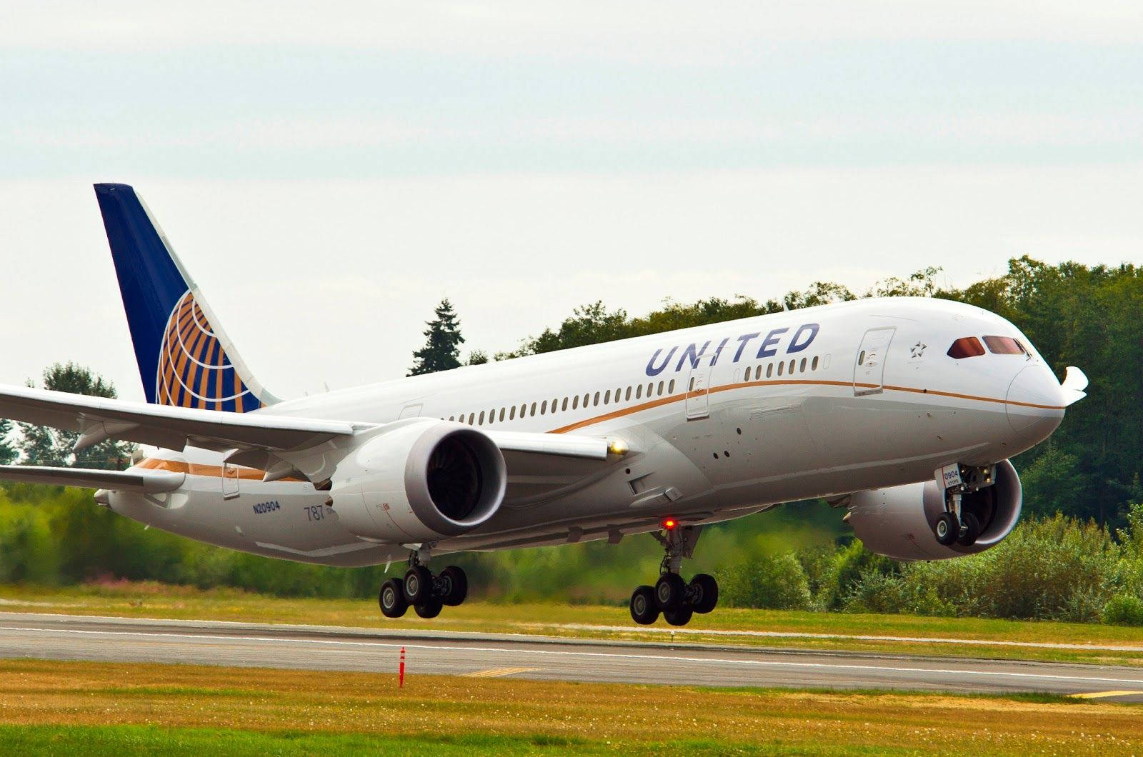 Boarding White United Airlines Plane