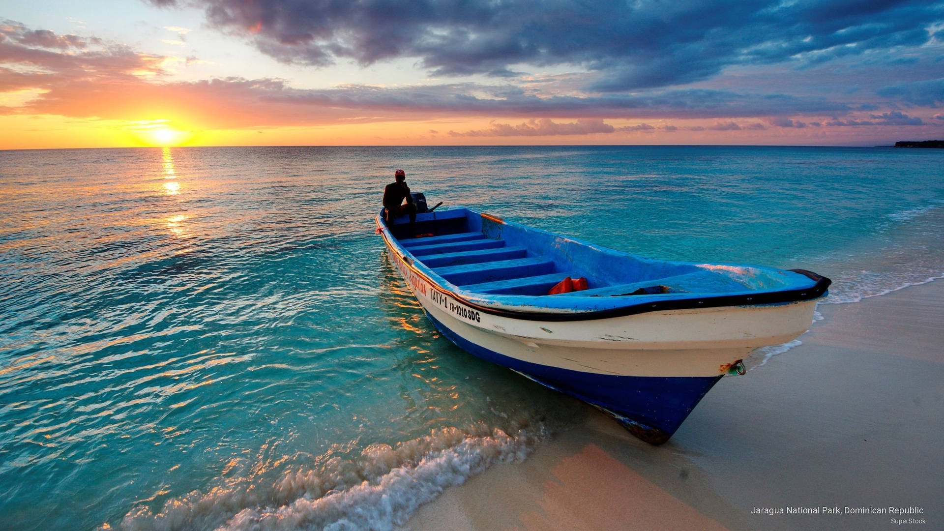 Boat On Turquoise Water Background