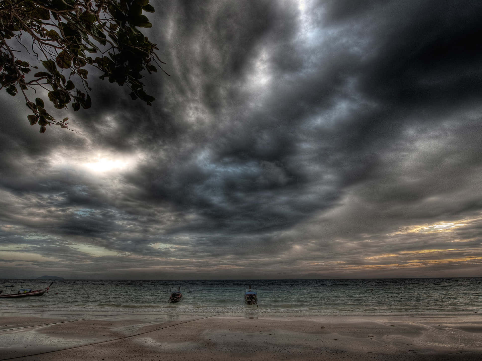 Boats Adrift Under Ominous Sky