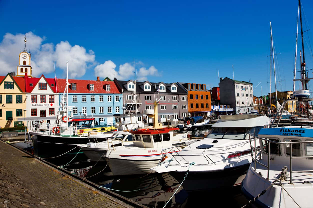 Boats On The Dock At Thorshavn Background
