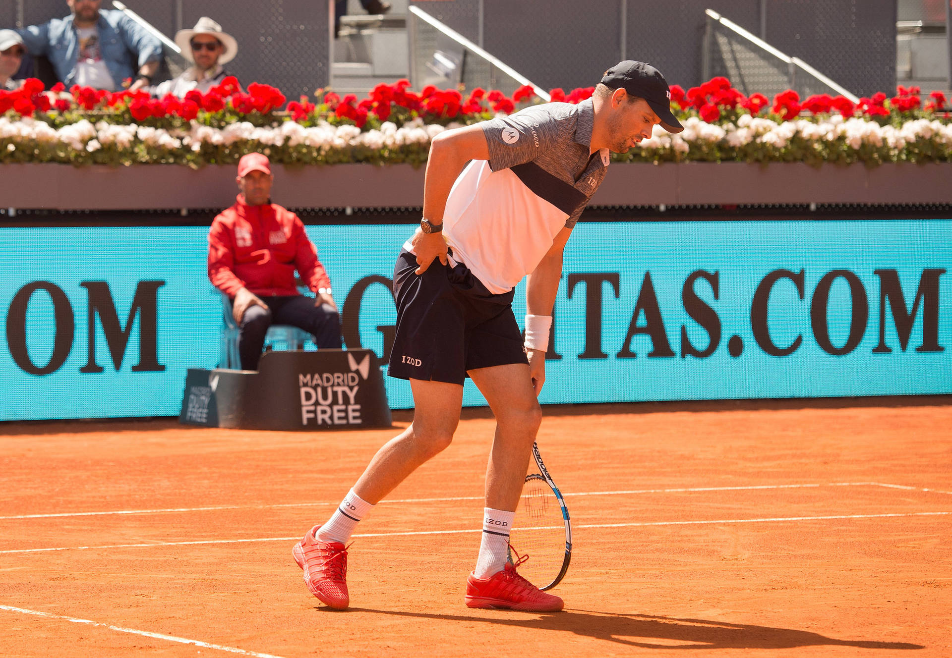 Bob Bryan Holding Hips