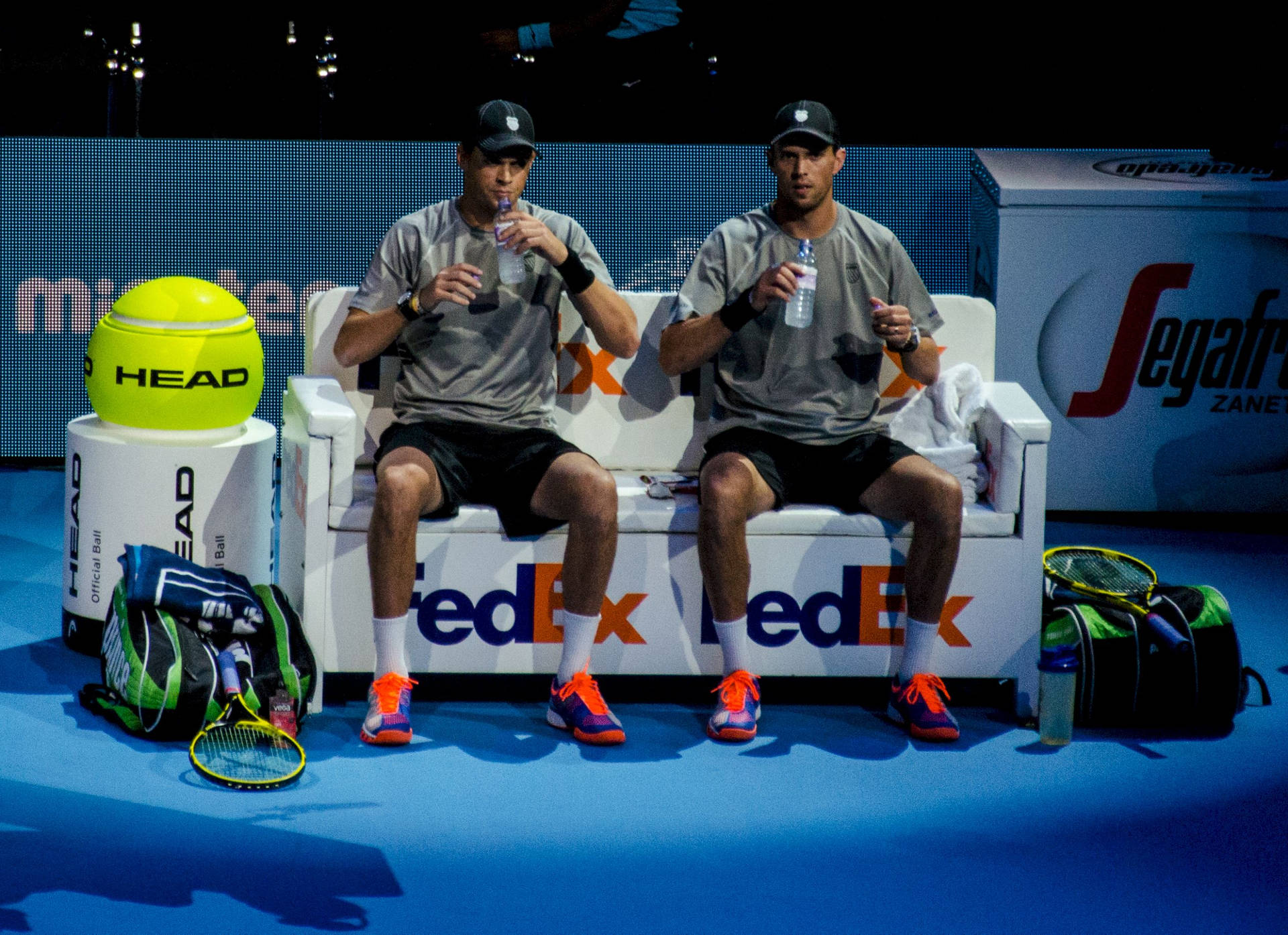 Bob Bryan Sitting Drinking With Mike Background