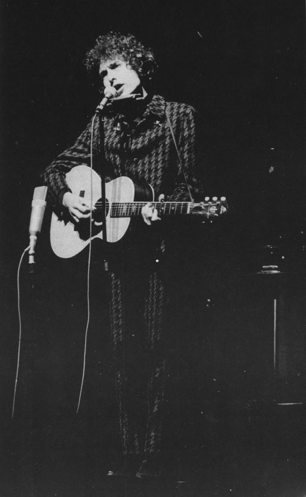 Bob Dylan Stage Performance Black And White Background