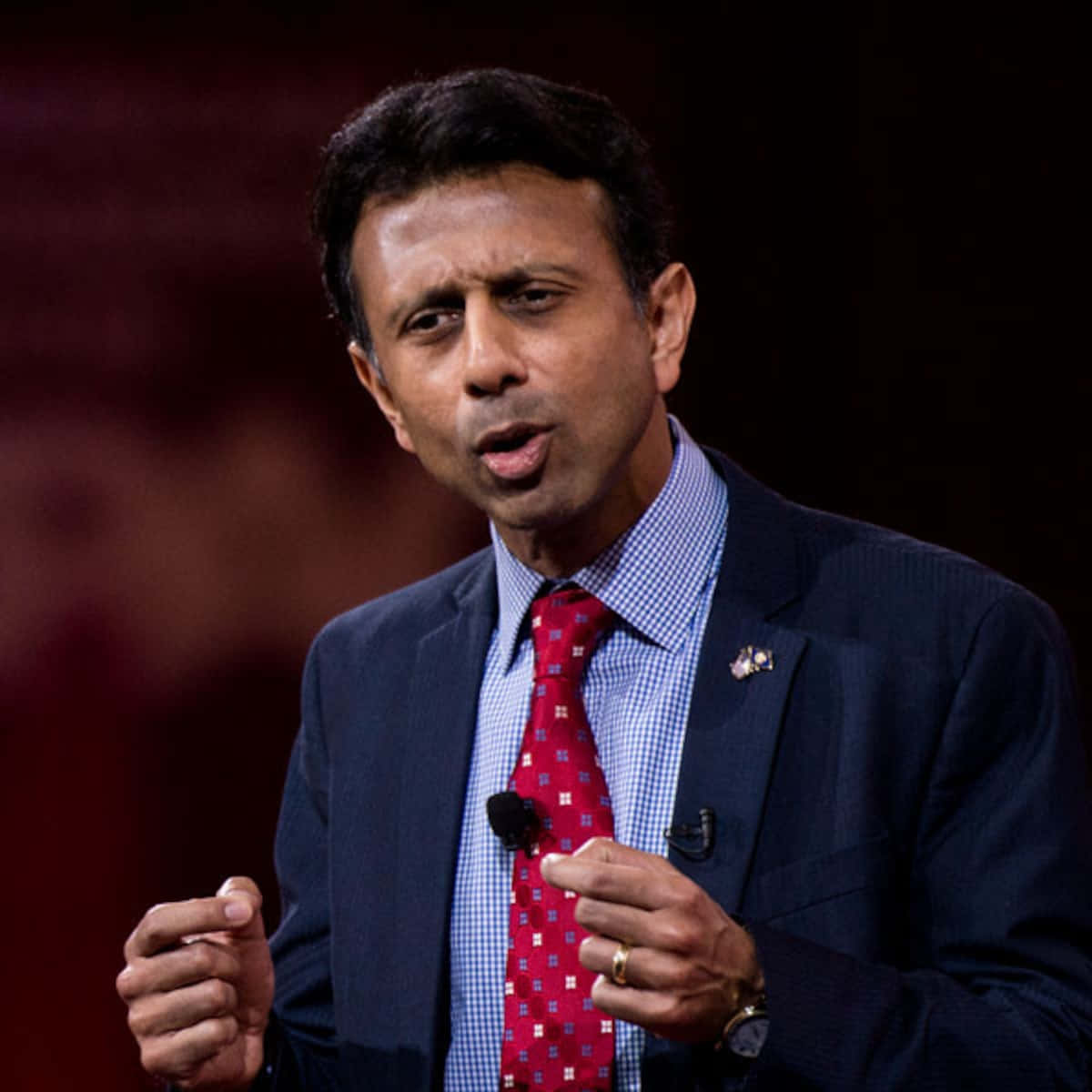 Bobby Jindal Answering A Question At A Press Conference Background