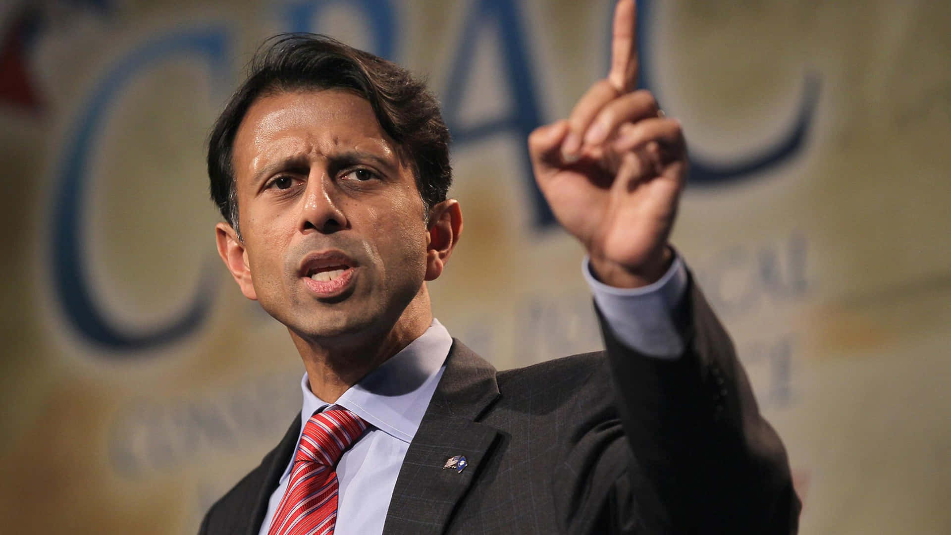 Bobby Jindal Pointing In Cpac Background