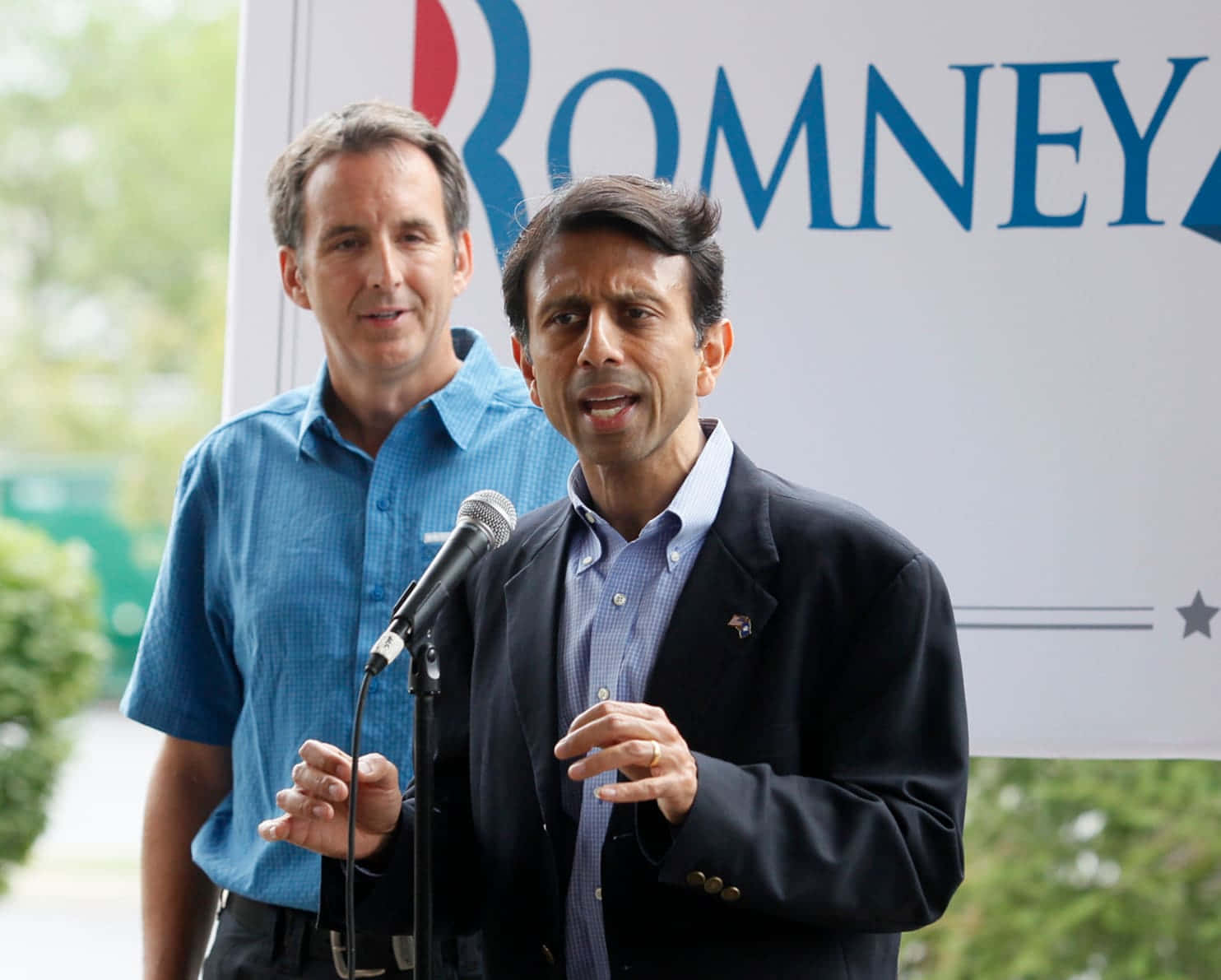 Bobby Jindal Speaking At A Rally For Mitt Romney Background