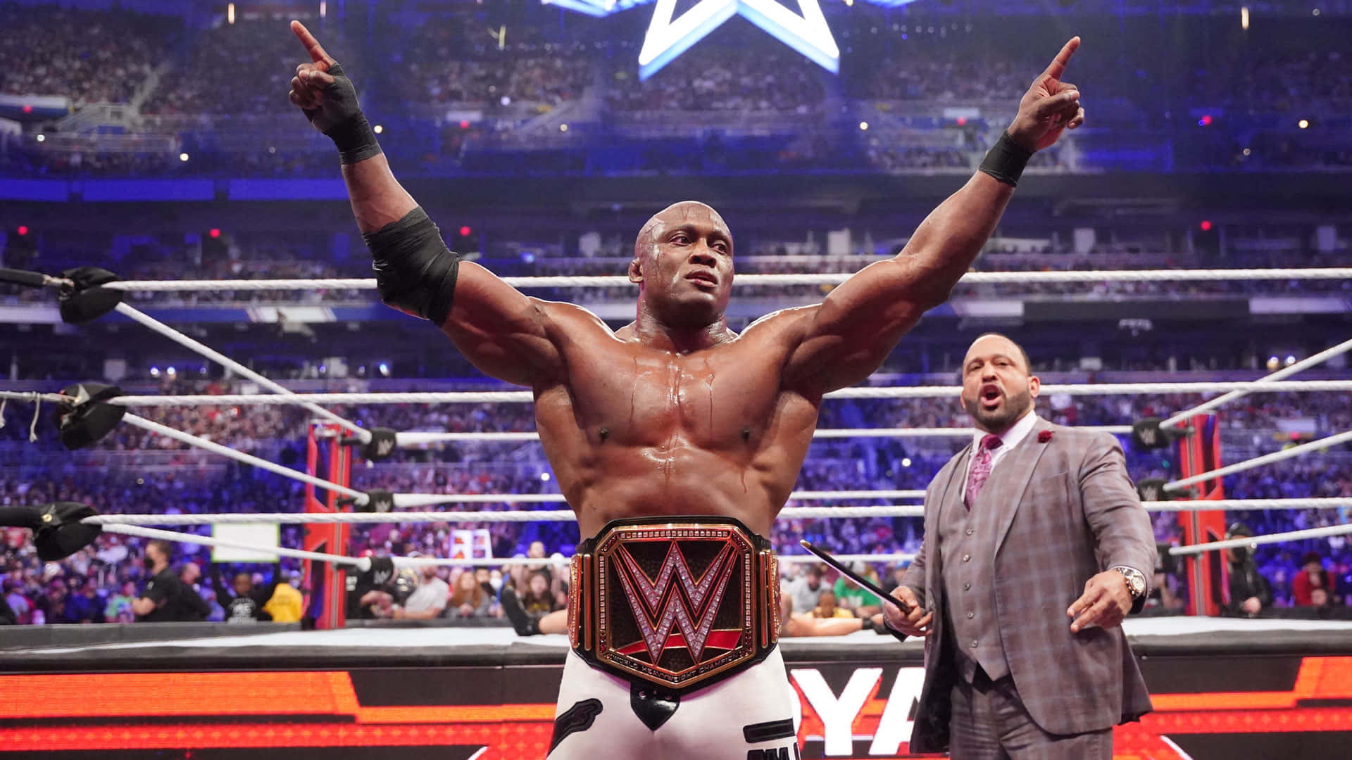 Bobby Lashley Celebrating His Victory Background