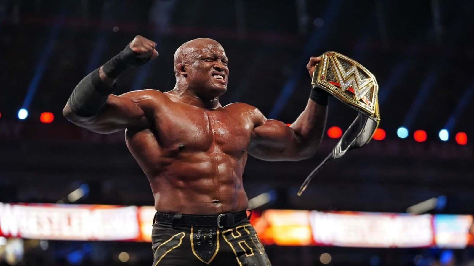 Bobby Lashley Roaring Triumphantly With Championship Belt Background