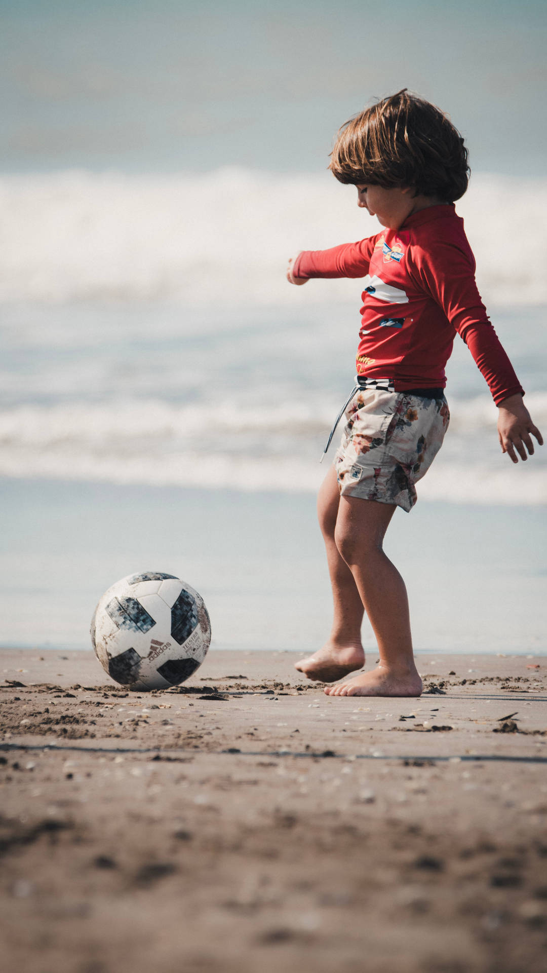 Bocce Ball Child Playing On Beach Background