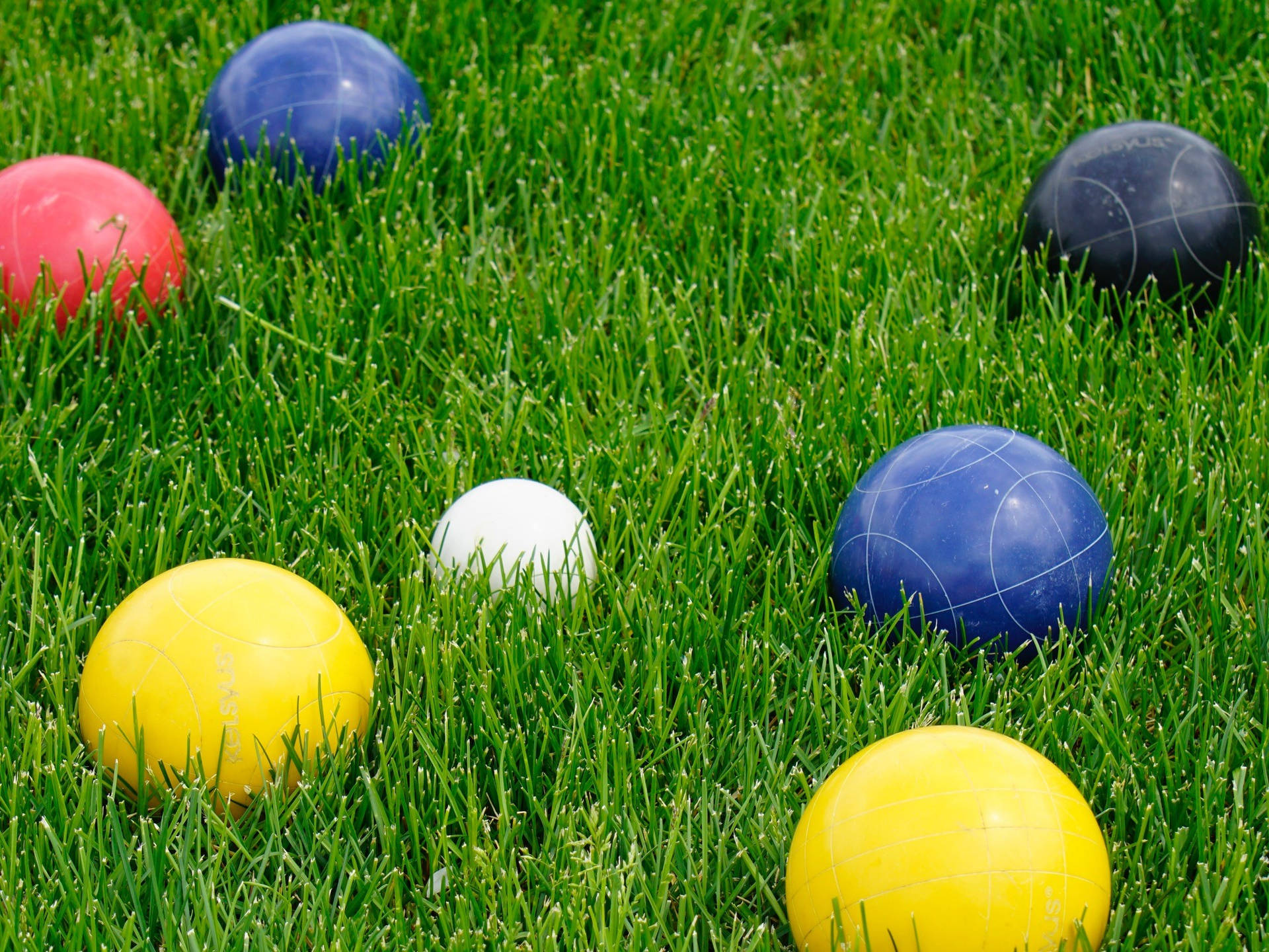 Bocce Ball Colorful On Grass Background