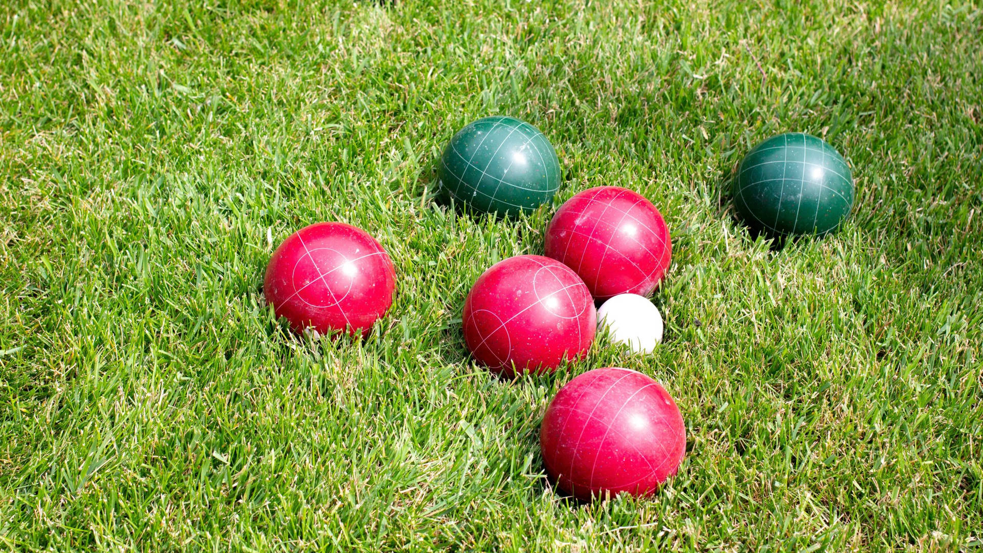 Bocce Ball Green And Red On Grass Background