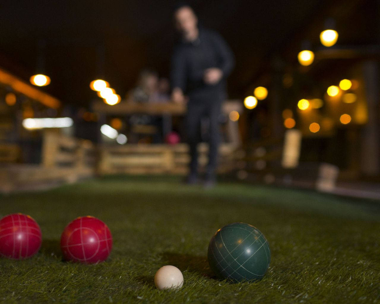 Bocce Ball On Grass At Night Background