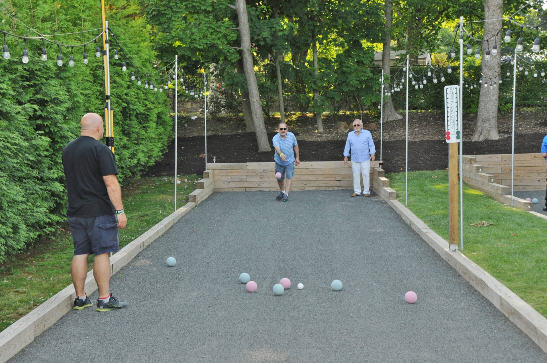 Bocce Ball People Playing On Court Background