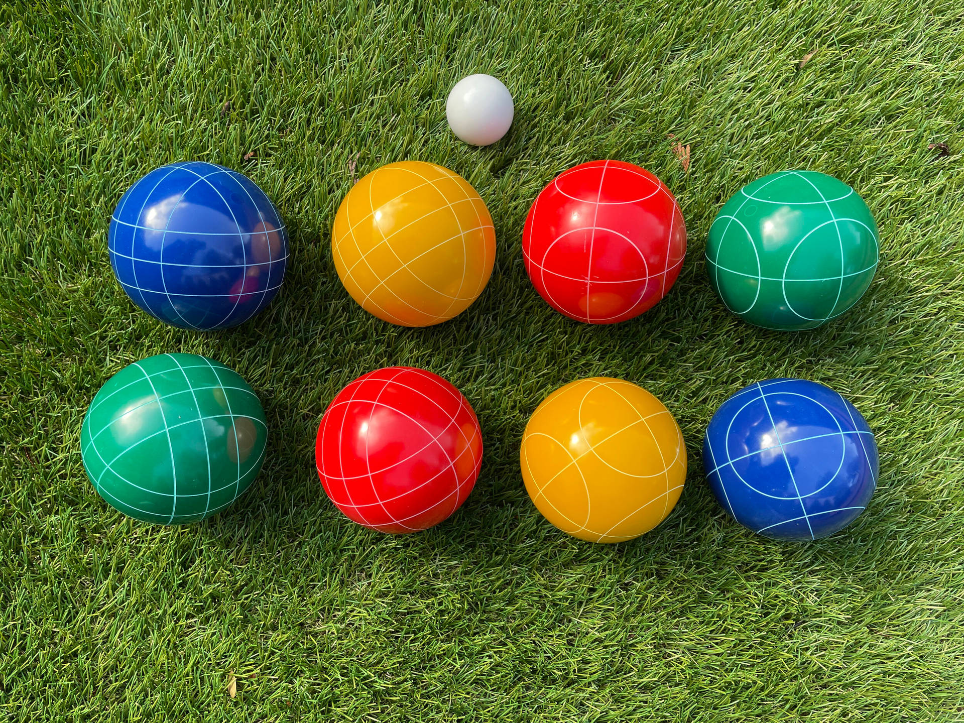 Bocce Ball Rows On Grass Background