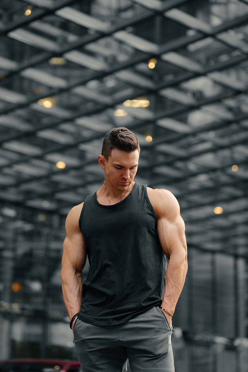 Bodybuilder Guy Posing Hd Background