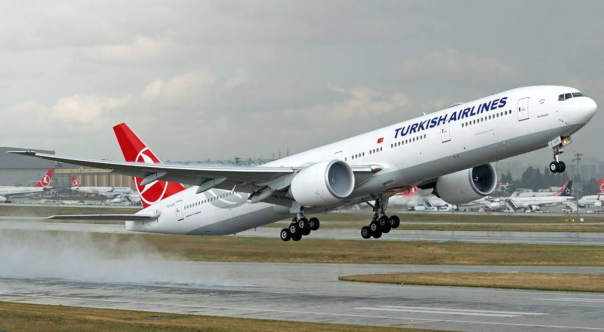 Boeing 777-3f2er From Turkish Airlines In Take-off Background