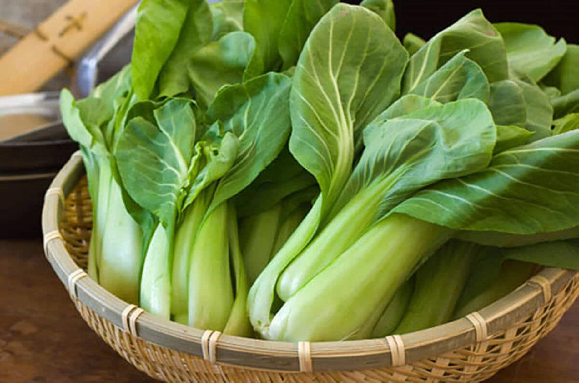 Bok Choy Cabbages In A Bamboo Basket Background