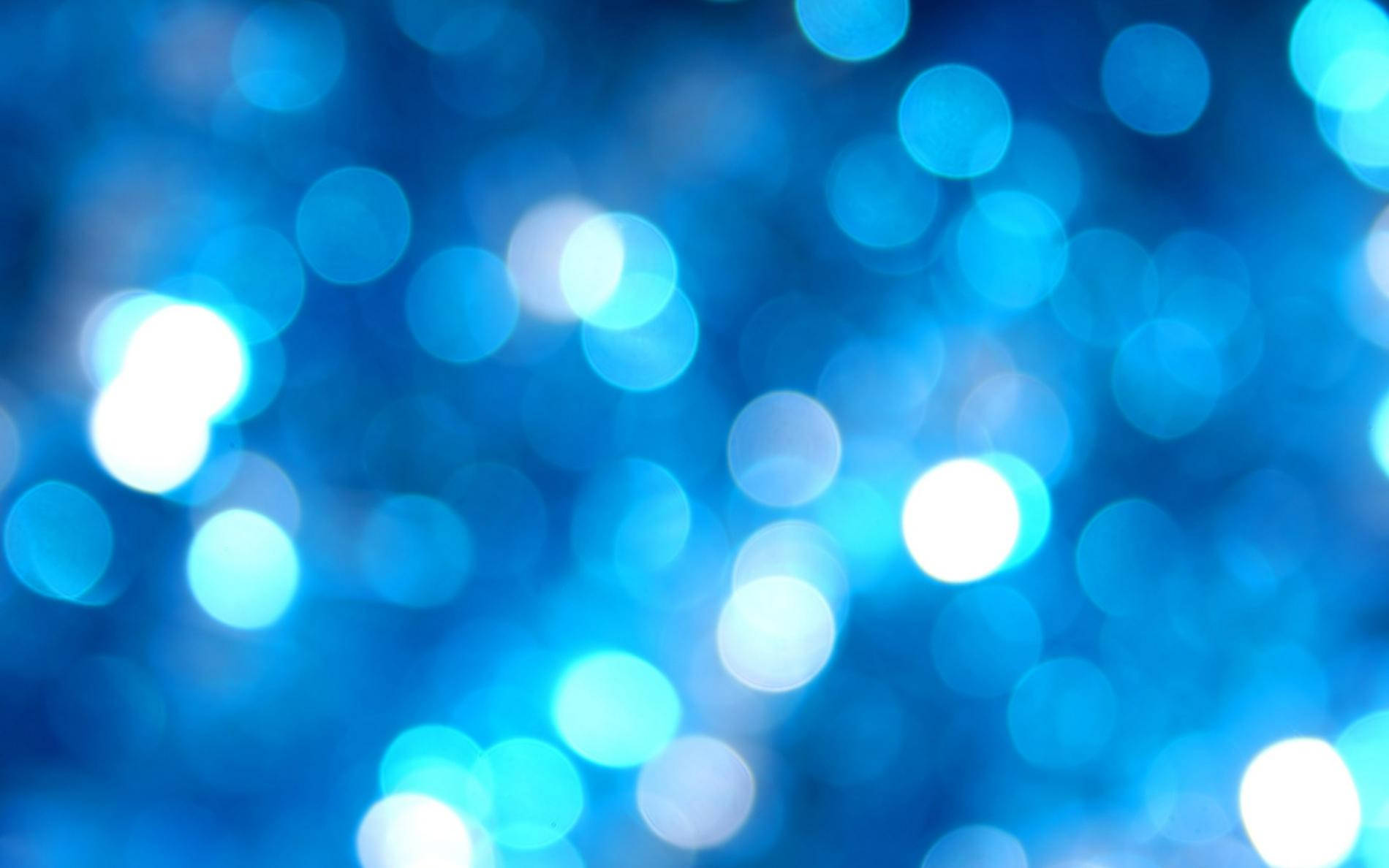 Bokeh Lights In Pretty Blue Color Background