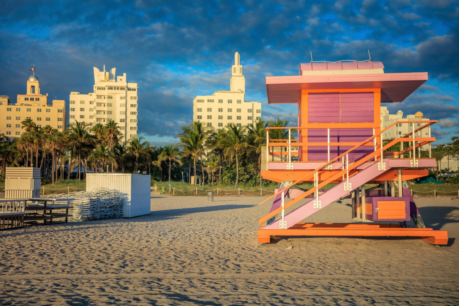 Bold & Colorful Lifeguard House On Miami Beach Background