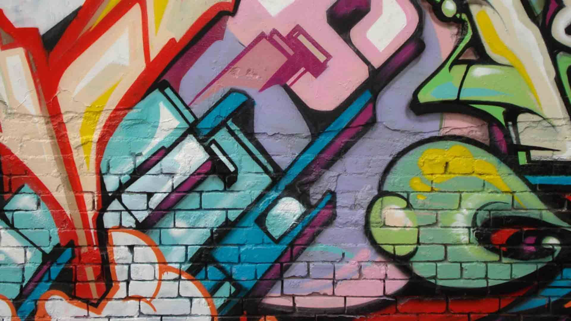 Bold Expression - Graffiti Art On A Laptop Background