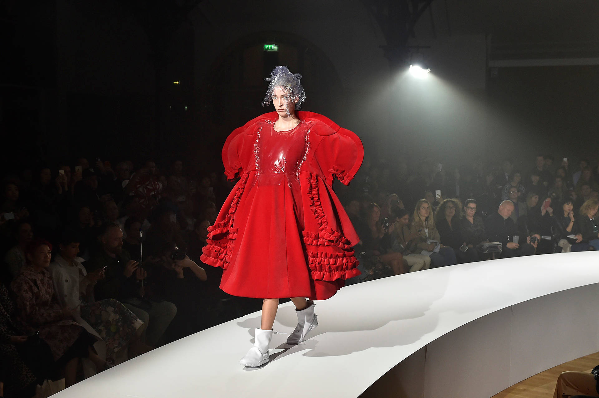 Bold Red Puffed Dress By Comme Des Garçons Background