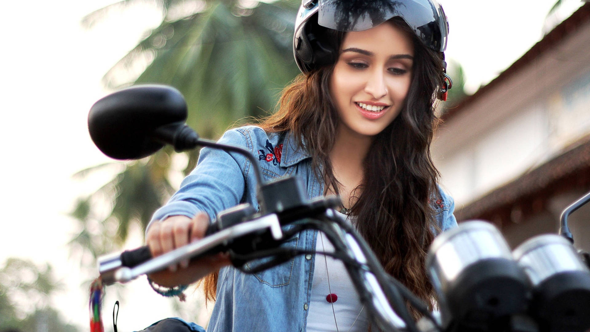 Bollywood Shraddha Kapoor On Motorcycle Background