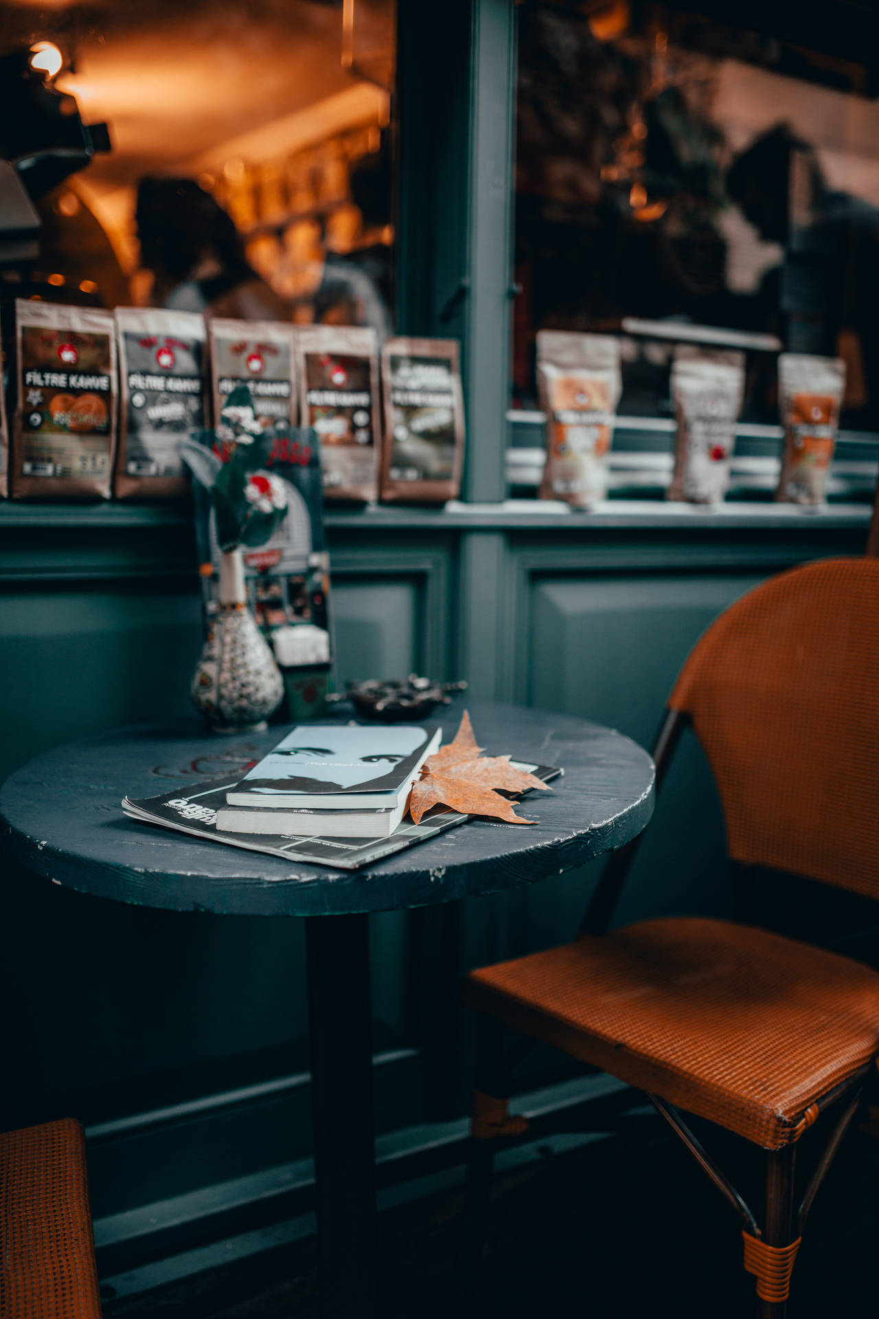 Book On A Coffee Shop Table Background