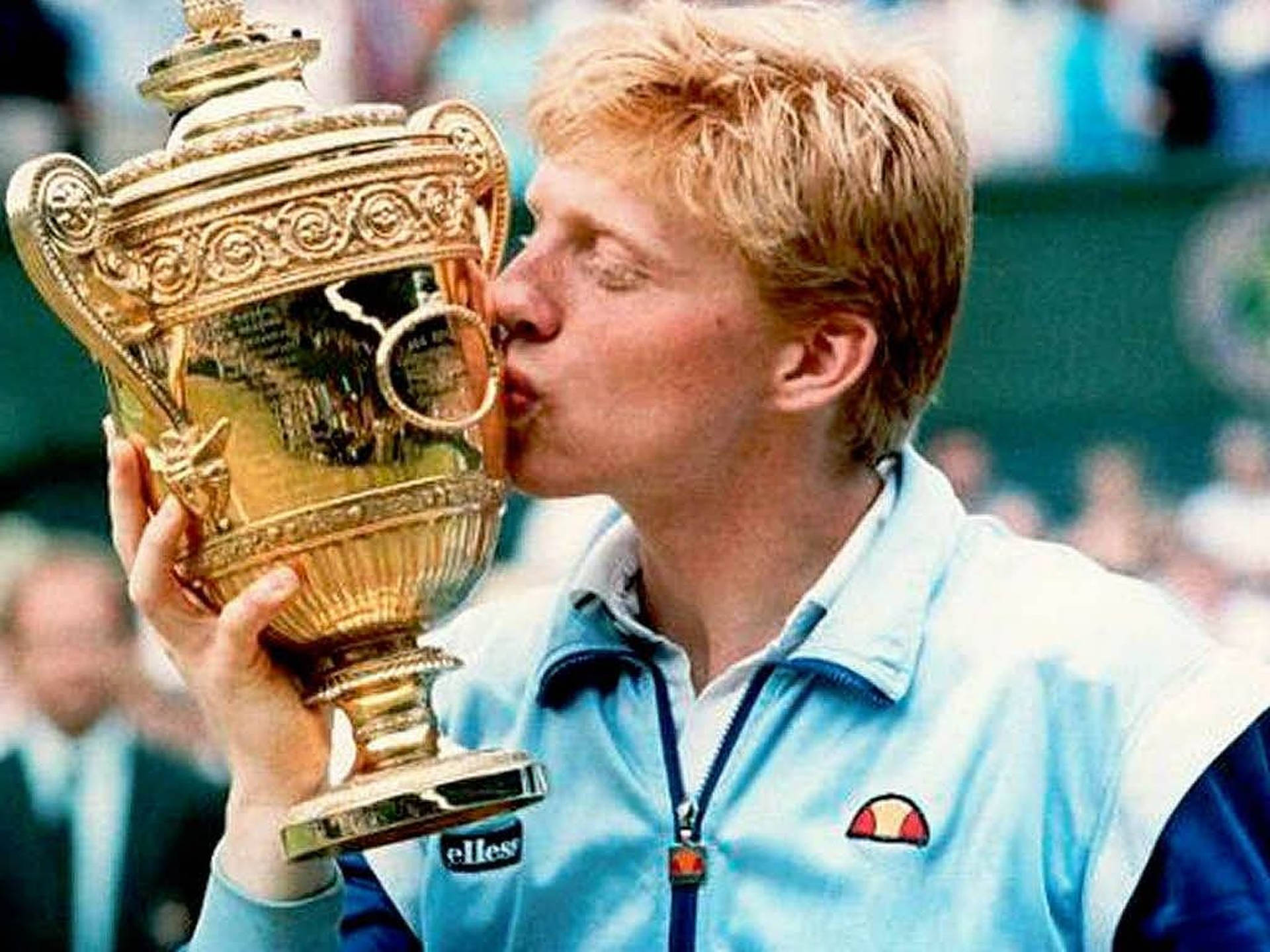 Boris Becker Kissing A Trophy Background