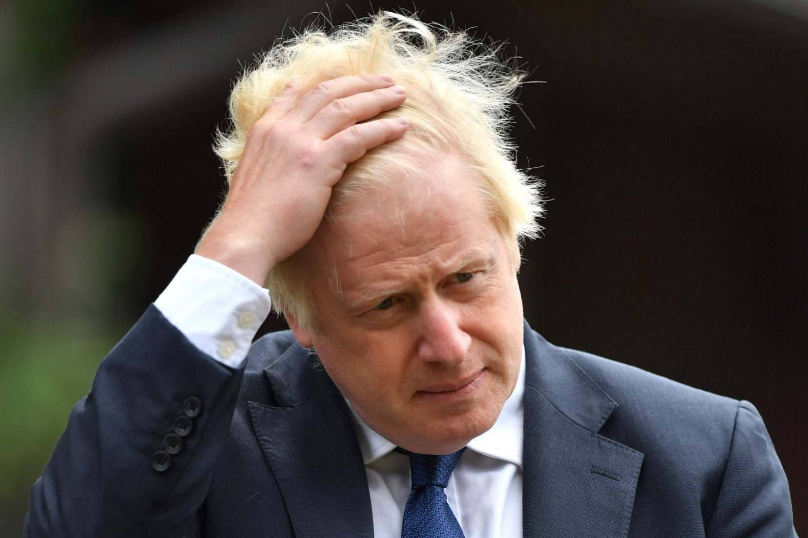 Boris Johnson Fixing His Hair Background