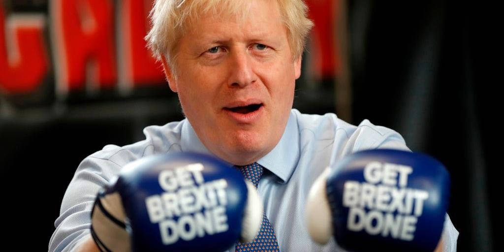 Boris Johnson Wearing A Boxing Gloves Background