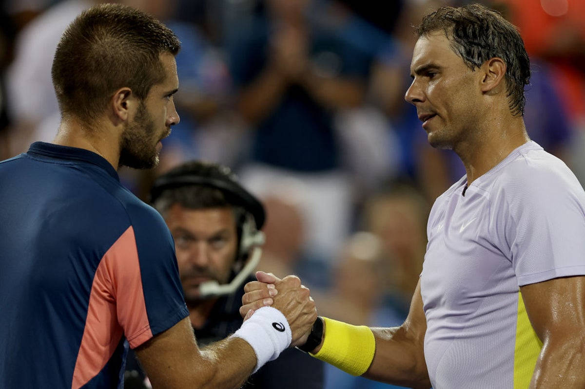 Borna Coric And Rafael Nadal Respect Background