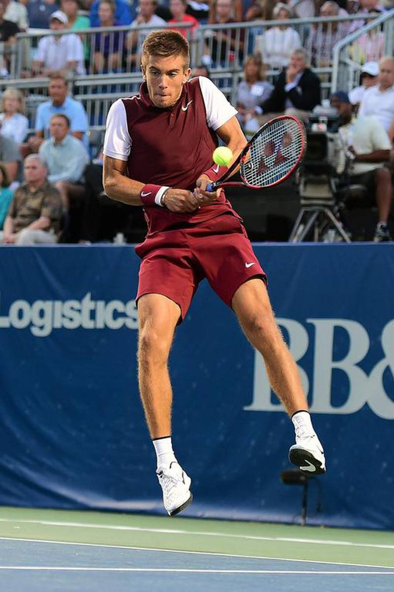 Borna Coric Jumping Up Background